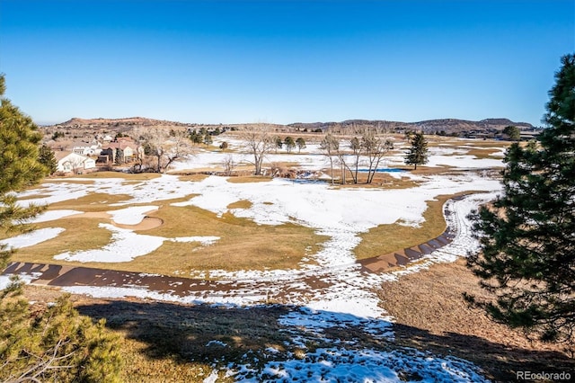 birds eye view of property featuring a mountain view