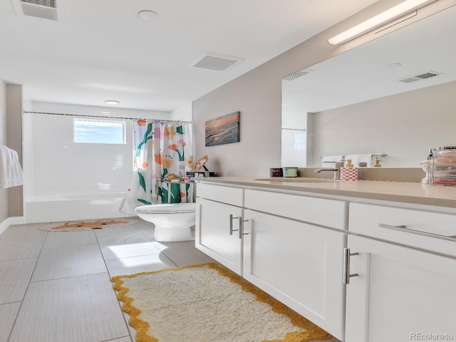 full bathroom with vanity, toilet, and shower / bath combo with shower curtain