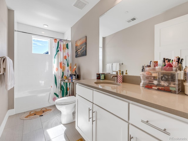 full bathroom with vanity, tile patterned flooring, toilet, and shower / bath combo