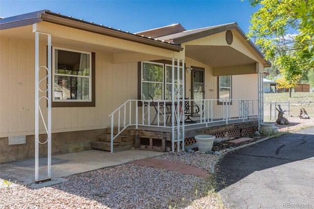 246 Loop Dr, Howard, CO 81233 - view of exterior entry with a porch