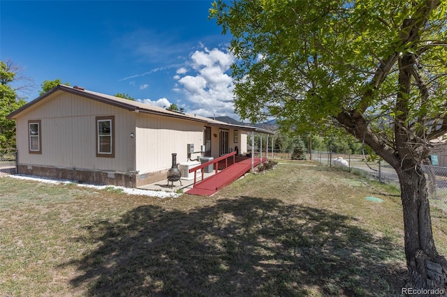 246 Loop Dr, Howard, CO 81233 - rear view of house with a patio