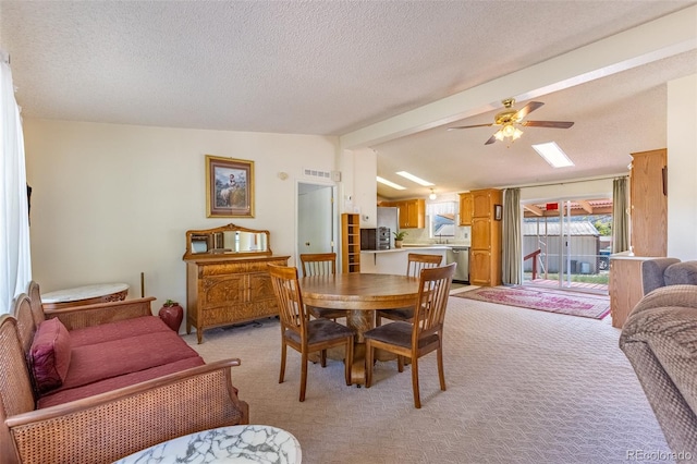 246 Loop Dr, Howard, CO 81233 - dining space with light colored carpet, a ceiling fan, and a textured ceiling