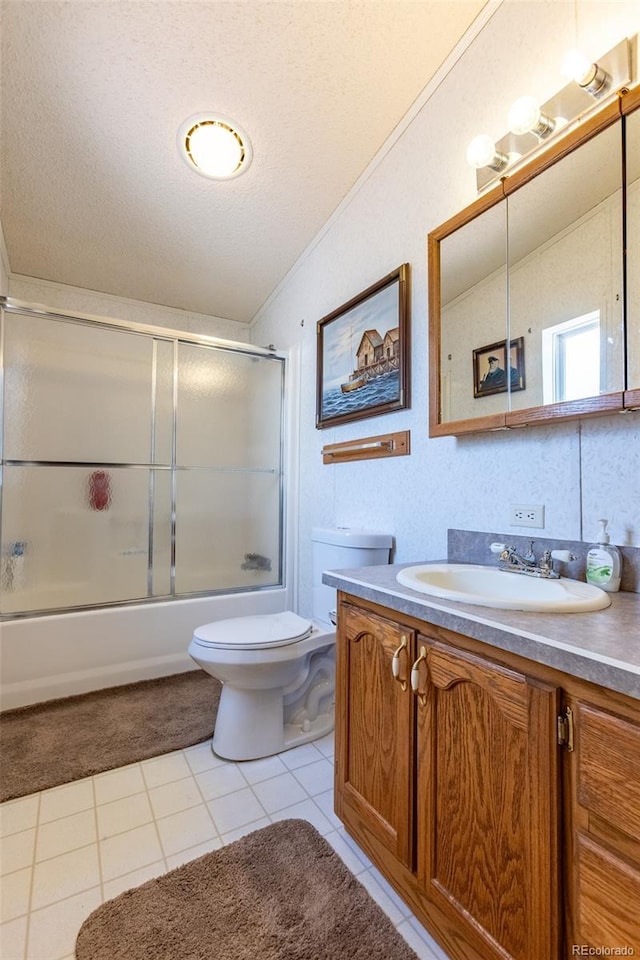 246 Loop Dr, Howard, CO 81233 - full bathroom with vanity, toilet, combined bath / shower with glass door, a textured ceiling, and lofted ceiling