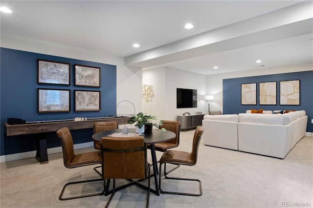 view of carpeted dining space