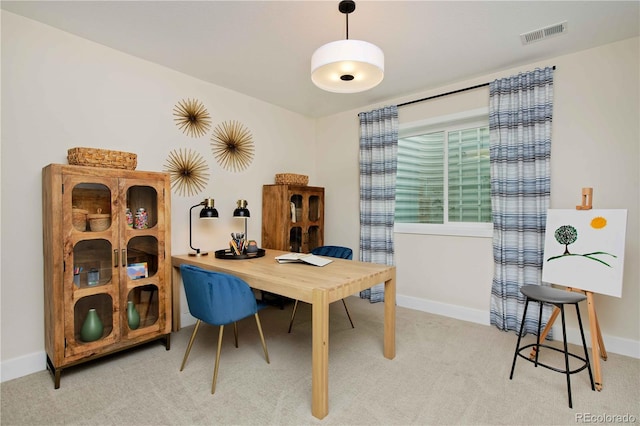 home office featuring light carpet