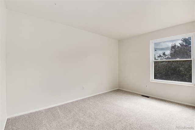 3961 S Uravan St, Aurora, CO 80013 - carpeted spare room with baseboards
