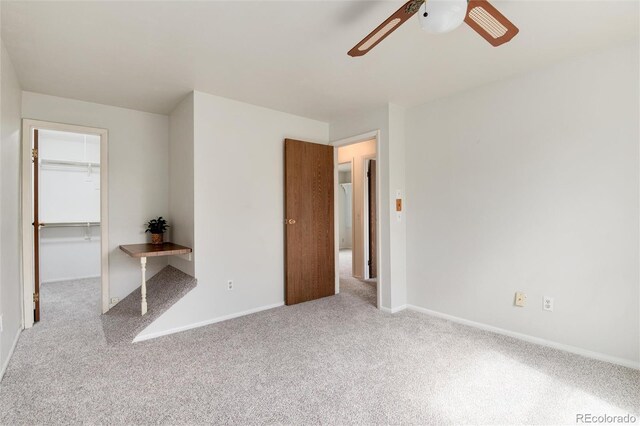 3961 S Uravan St, Aurora, CO 80013 - spare room featuring a ceiling fan, carpet floors, and baseboards