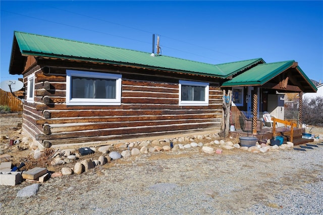 view of log cabin