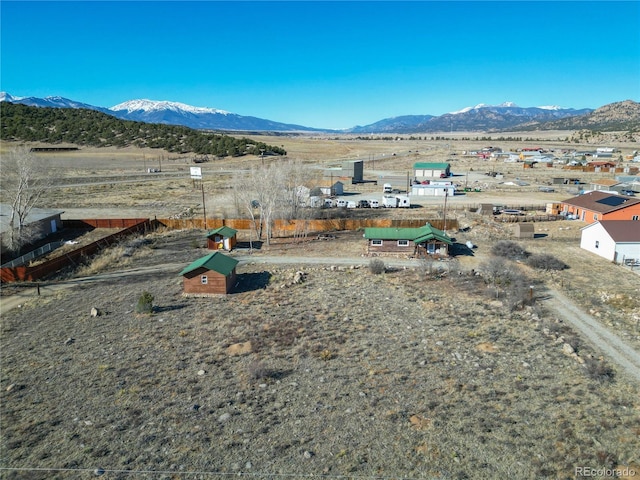 view of yard featuring a mountain view and a rural view