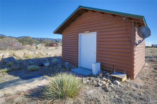 view of outdoor structure with a mountain view