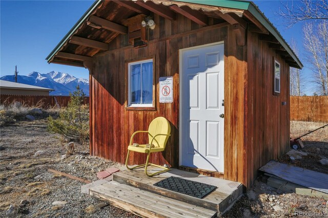 view of outbuilding featuring a mountain view