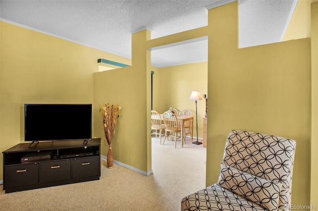 sitting room featuring light colored carpet