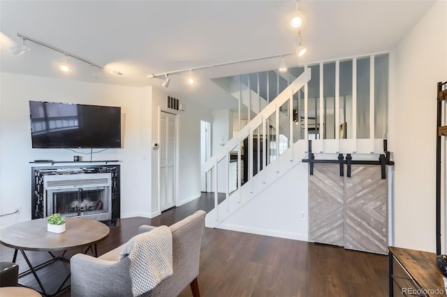 living room featuring dark wood-type flooring