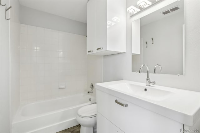 full bathroom with toilet, vanity, and shower / tub combination