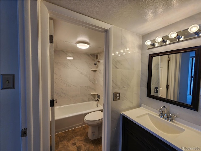 1020 15th St Unit 25D, Denver, CO 80202 - full bath with toilet, vanity, a textured ceiling, and washtub / shower combination