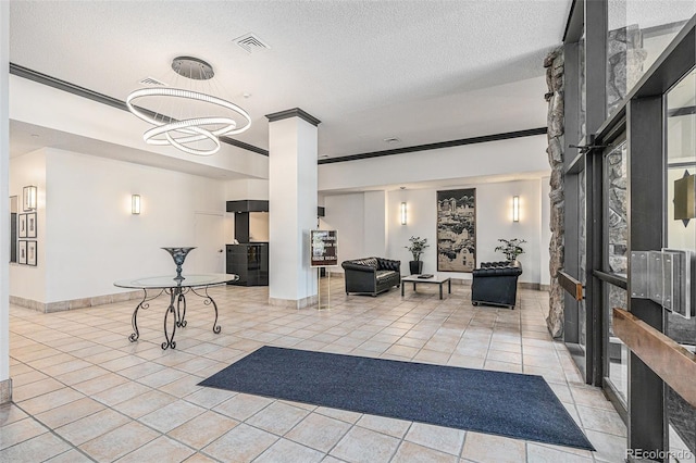 1020 15th St Unit 25D, Denver, CO 80202 - building lobby featuring crown molding and a textured ceiling