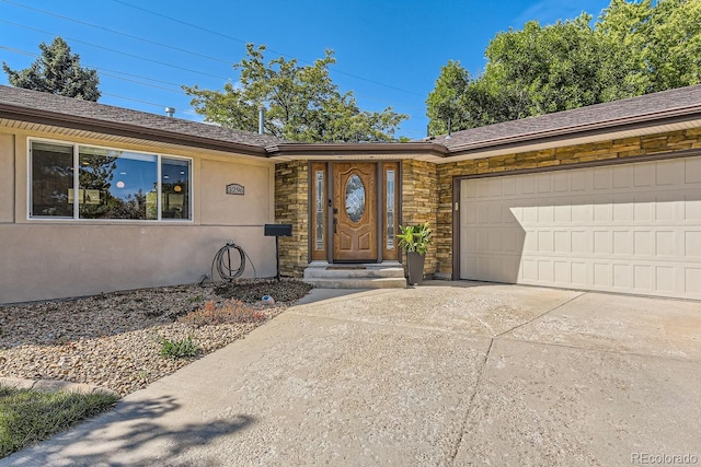 single story home with a garage