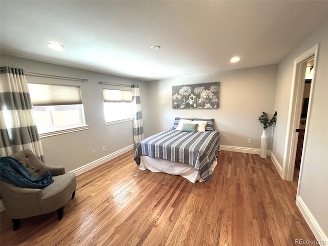 bedroom featuring hardwood / wood-style floors