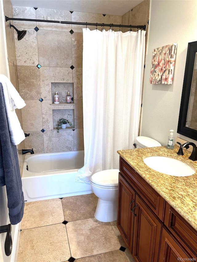 full bathroom featuring toilet, shower / tub combo with curtain, and vanity