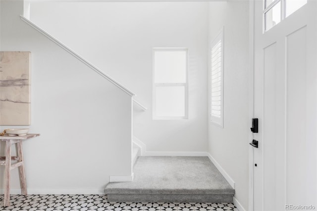 15006 Cast Pebble Cir, Parker, CO 80134 - foyer entrance featuring plenty of natural light and stairway