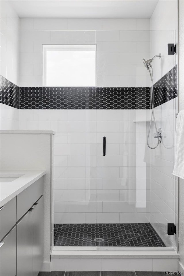 15006 Cast Pebble Cir, Parker, CO 80134 - full bathroom featuring a stall shower and vanity