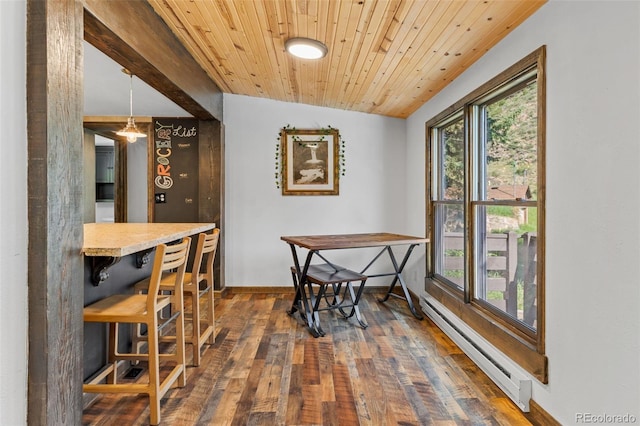 55 Two Moon Rd, Idaho Springs, CO 80452 - dining space featuring baseboard heating, hardwood / wood-style floors, and wood ceiling