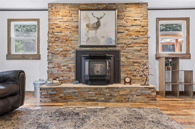 55 Two Moon Rd, Idaho Springs, CO 80452 - detailed view of wood finished floors, a glass covered fireplace, and wooden walls