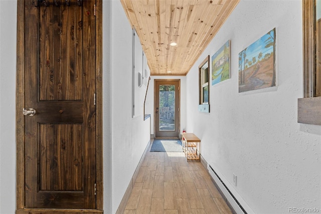 55 Two Moon Rd, Idaho Springs, CO 80452 - corridor featuring wooden ceiling, wood finished floors, and a textured wall