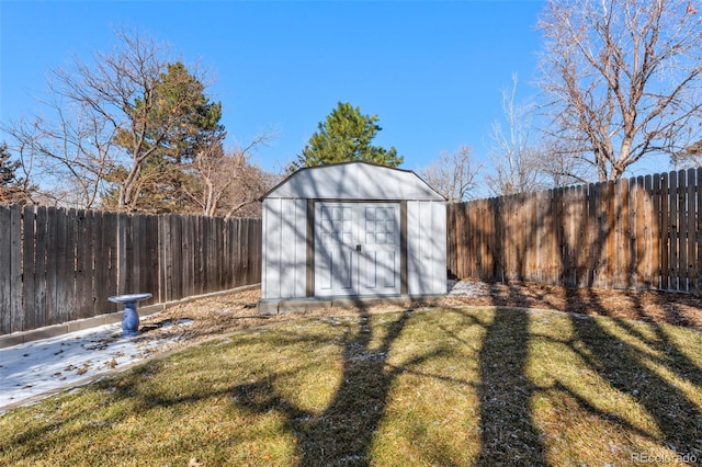 view of shed with a fenced backyard