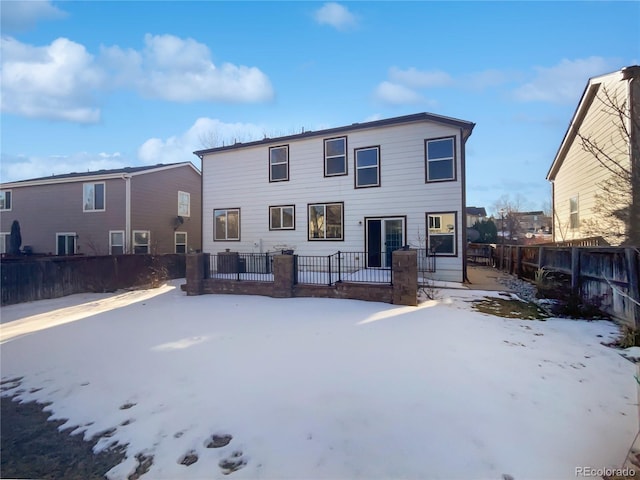 view of snow covered property