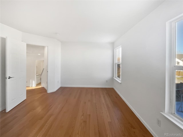 empty room with light wood-type flooring