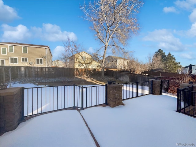 view of snow covered pool