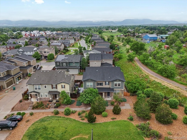 14823 W 70th Dr Unit A, Arvada, CO 80007 - aerial perspective of suburban area with a mountain backdrop