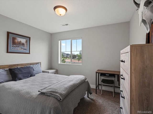 14823 W 70th Dr Unit A, Arvada, CO 80007 - bedroom featuring carpet floors and baseboards