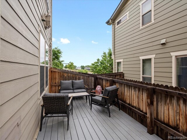 14823 W 70th Dr Unit A, Arvada, CO 80007 - deck with outdoor lounge area