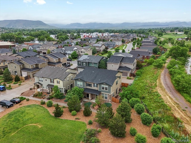 14823 W 70th Dr Unit A, Arvada, CO 80007 - aerial perspective of suburban area featuring a mountain backdrop