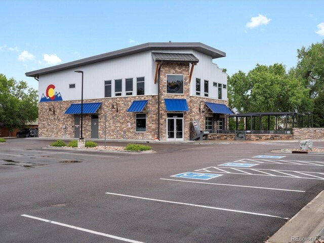 14823 W 70th Dr Unit A, Arvada, CO 80007 - view of property with uncovered parking