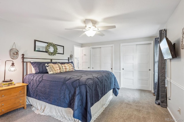6880 E Appleton Cir, Centennial, CO 80112 - bedroom with carpet floors, two closets, ceiling fan, and baseboards
