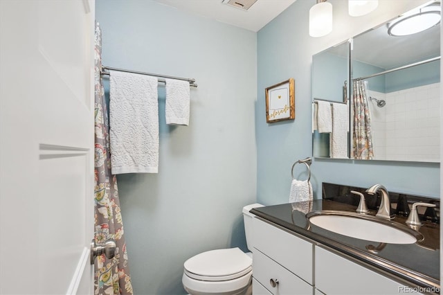 6880 E Appleton Cir, Centennial, CO 80112 - bathroom with vanity, toilet, and curtained shower