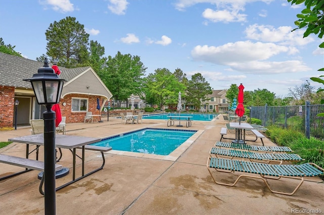 6880 E Appleton Cir, Centennial, CO 80112 - community pool featuring a patio area