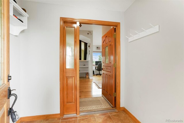 41504 Vista Rdg, Parker, CO 80138 - hall featuring baseboards and light tile patterned floors