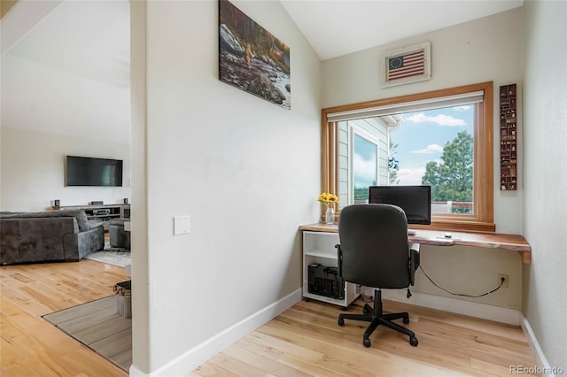41504 Vista Rdg, Parker, CO 80138 - office area featuring wood finished floors, baseboards, and lofted ceiling