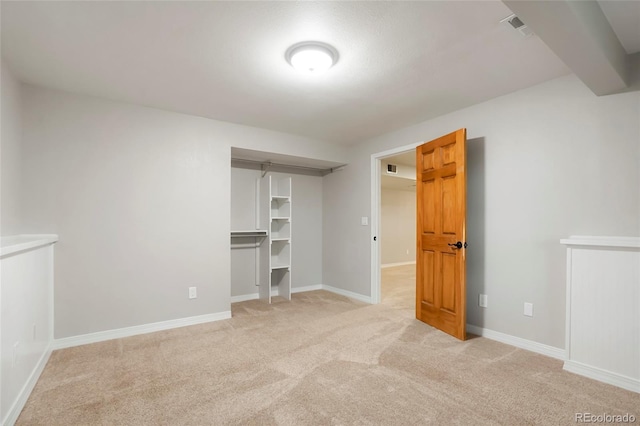 41504 Vista Rdg, Parker, CO 80138 - unfurnished bedroom featuring light colored carpet, baseboards, and a spacious closet