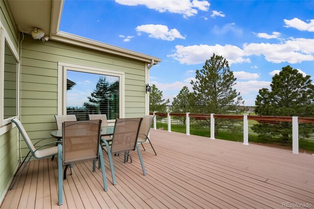 41504 Vista Rdg, Parker, CO 80138 - wooden terrace with outdoor dining area