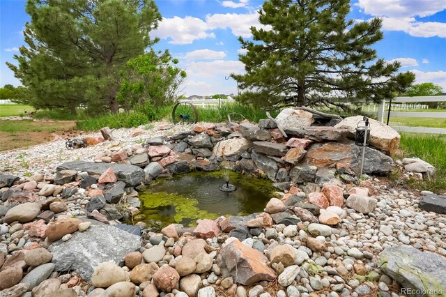41504 Vista Rdg, Parker, CO 80138 - exterior view of a small pond