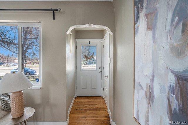 doorway to outside with hardwood / wood-style floors