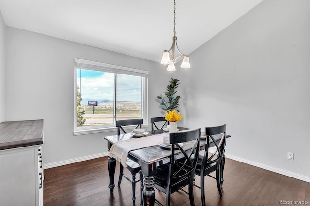 16655 W 2nd Ave, Golden, CO 80401 - dining area featuring baseboards, an inviting chandelier, and dark wood-type flooring