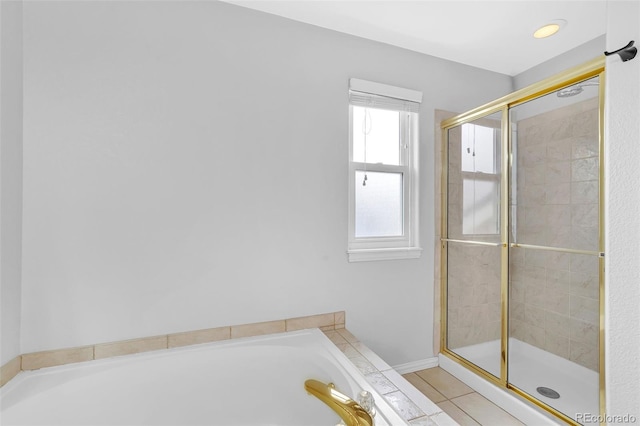16655 W 2nd Ave, Golden, CO 80401 - full bathroom with a bath, tile patterned flooring, and a stall shower