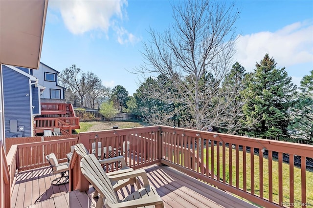 16655 W 2nd Ave, Golden, CO 80401 - wooden deck featuring a yard