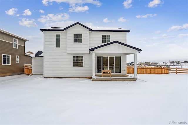 view of snow covered property